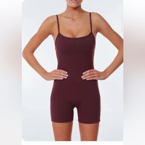 It's Now Cool Brown Onesie